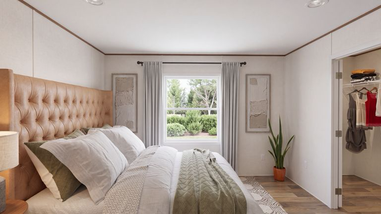 Primary bedroom with closet